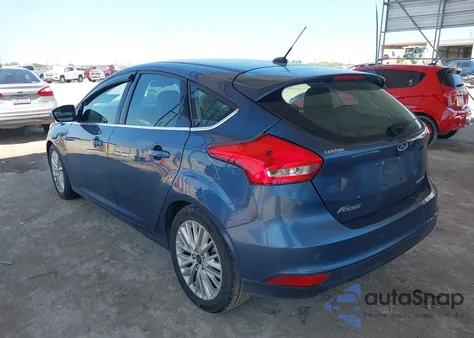 2018 Ford Focus Titanium z USA, uszkodzony, nr VIN 1FADP3N21JL230788